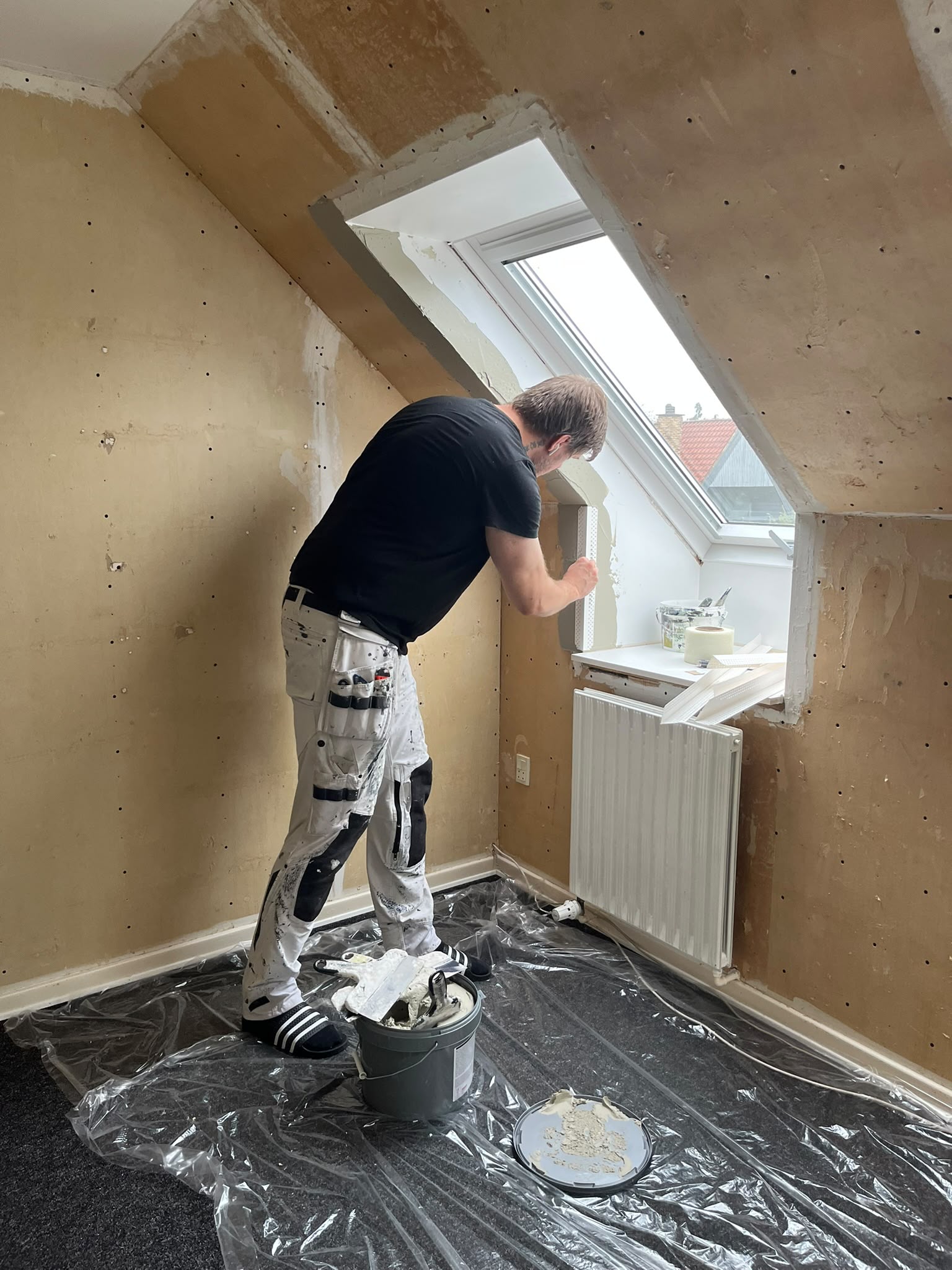 Maler i Horsens i arbejde